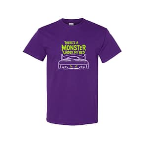Purple T-shirt featuring lime-green text 'There’s a Monster Under My Bed' above a drawn bed with glowing yellow eyes underneath, playful design.
