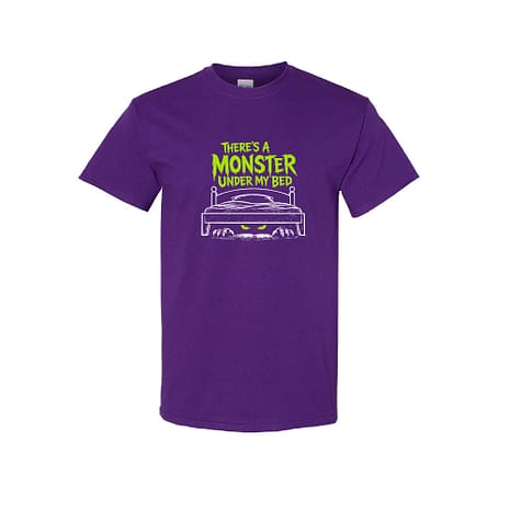 Purple T-shirt featuring lime-green text 'There’s a Monster Under My Bed' above a drawn bed with glowing yellow eyes underneath, playful design.