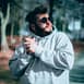 Man wearing the Big Daddy Grey Hoodie in size 3XL
