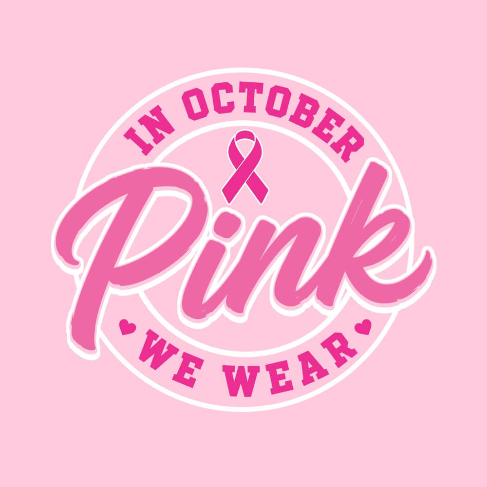 Circular "In October We Wear Pink" breast cancer awareness design featuring a pink ribbon and bold script lettering for custom Pink Out shirts and fundraiser apparel.